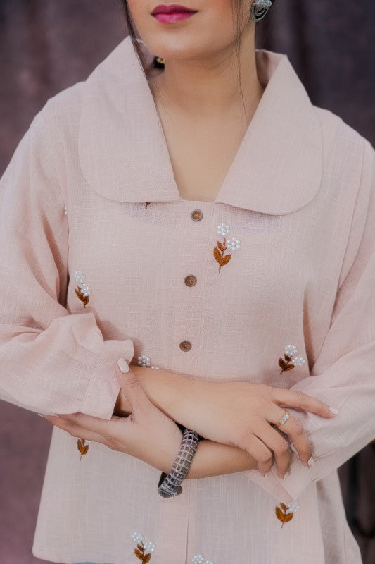 Flower embellished peach shirt
