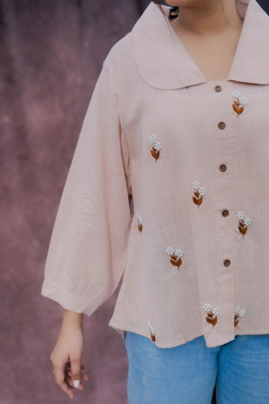 Flower embellished peach shirt
