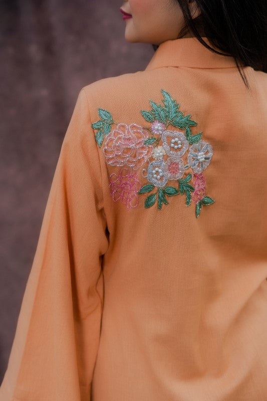 Long shirt with front and back embellishment