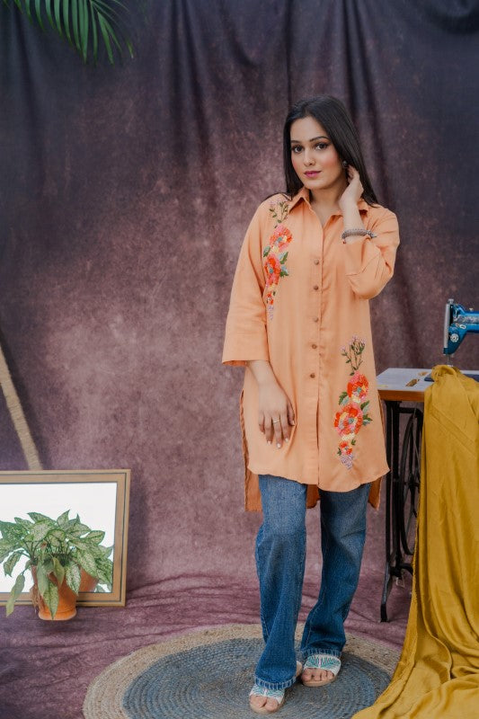 Long shirt with front and back embellishment