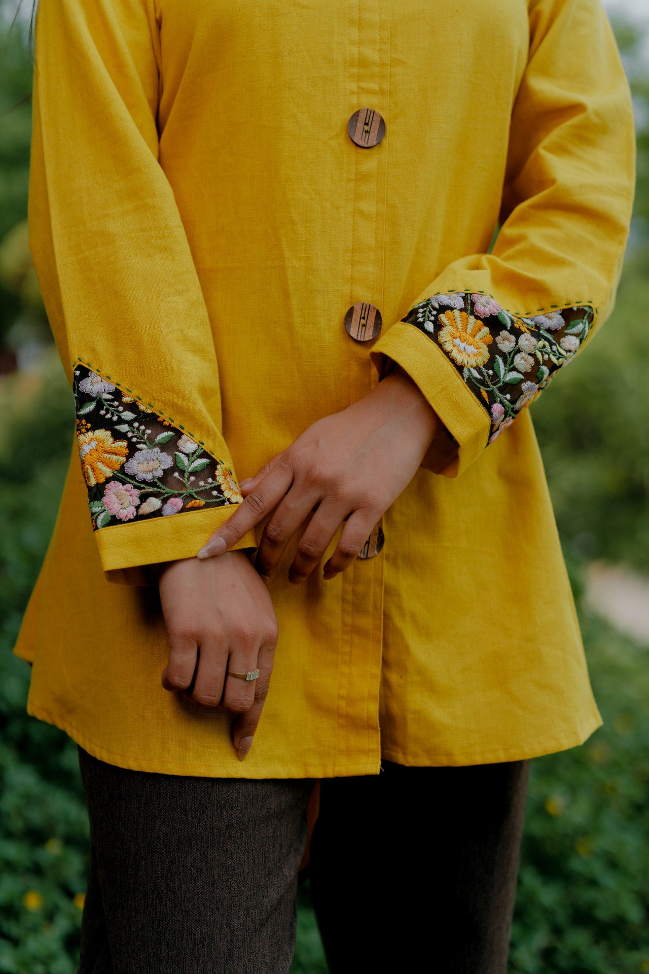 Mustard shirt with floral embroidered sleeves