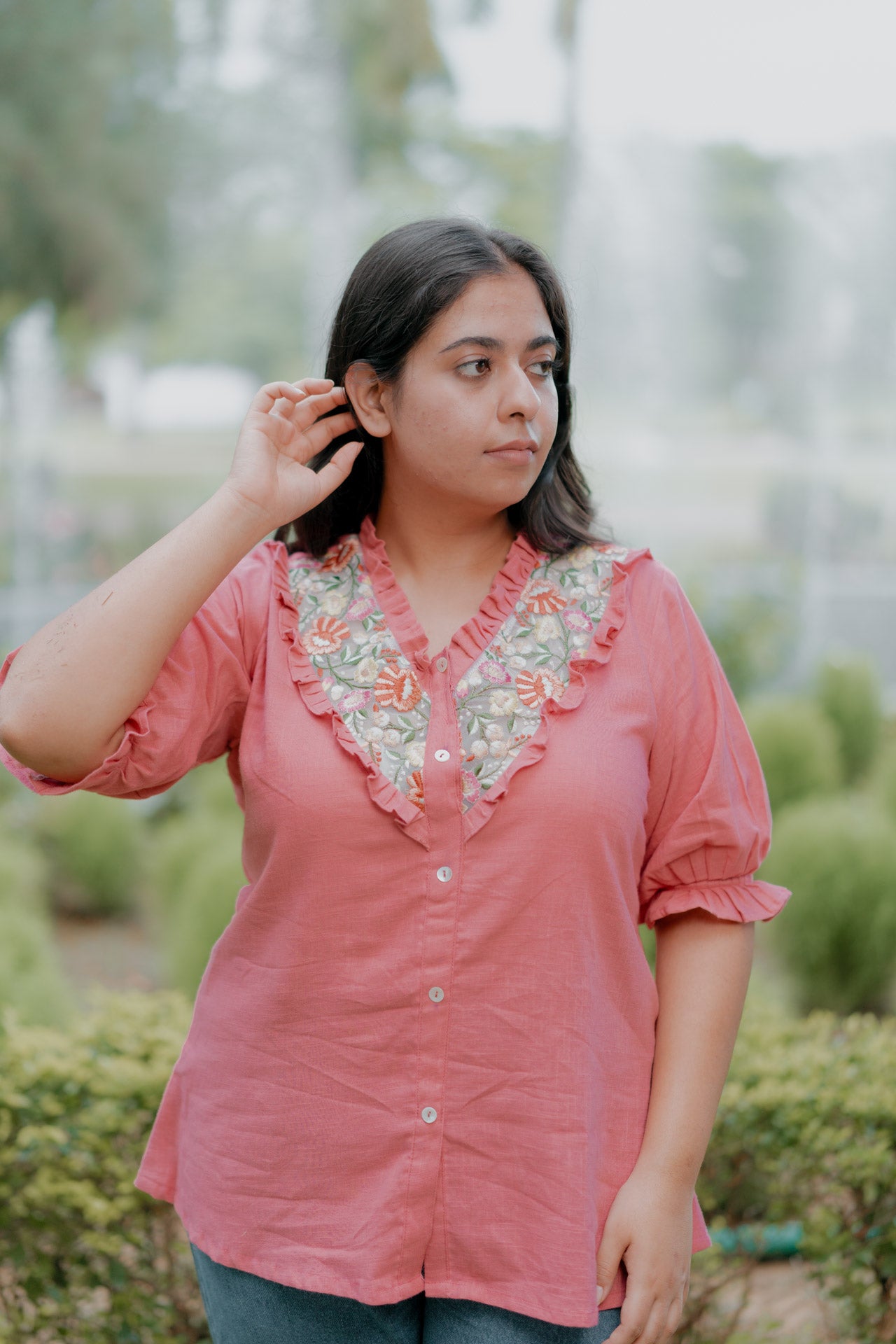 Floral necklace embellished top