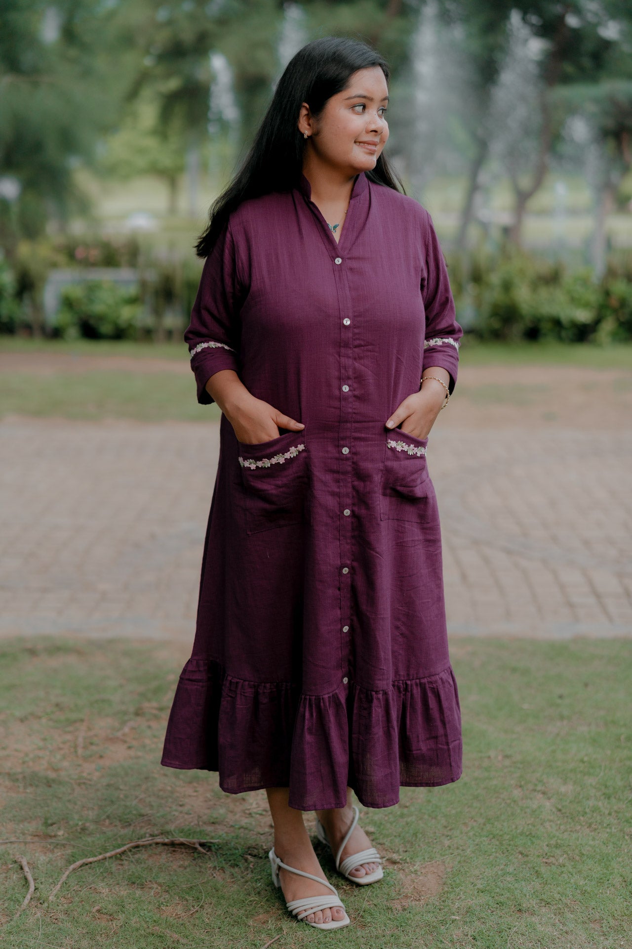 Purple frill dress with floral embellishment