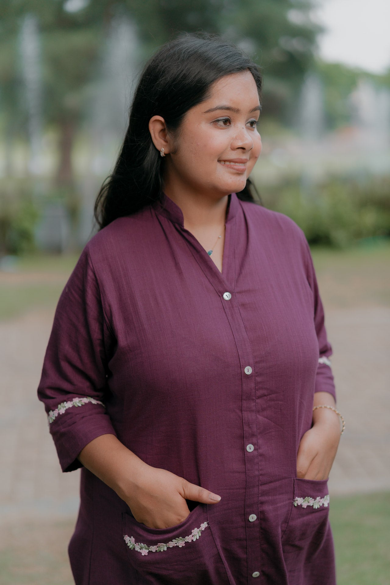 Purple frill dress with floral embellishment