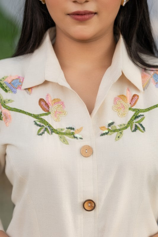 Dress with vines embellishment