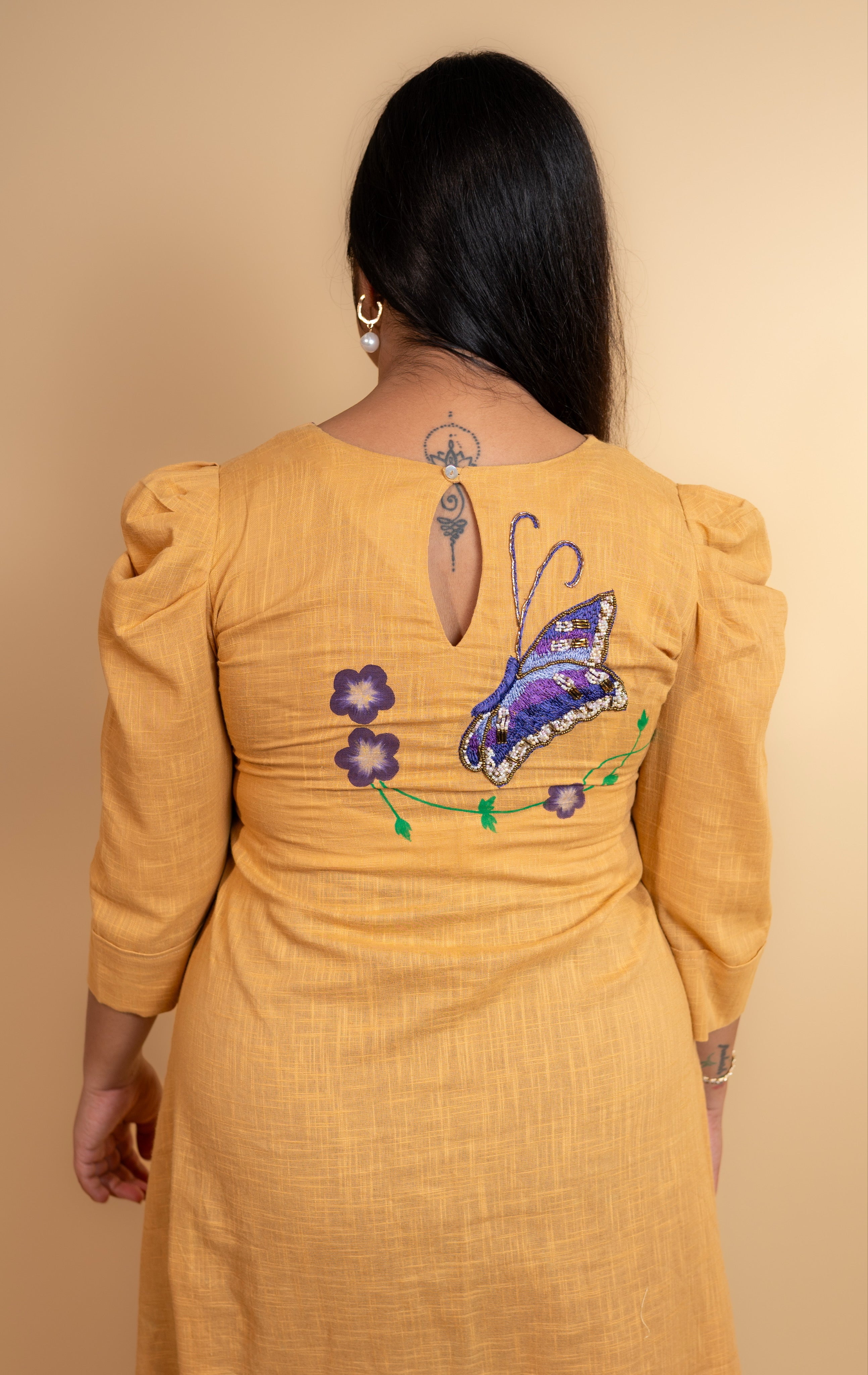 Golden flutter dress