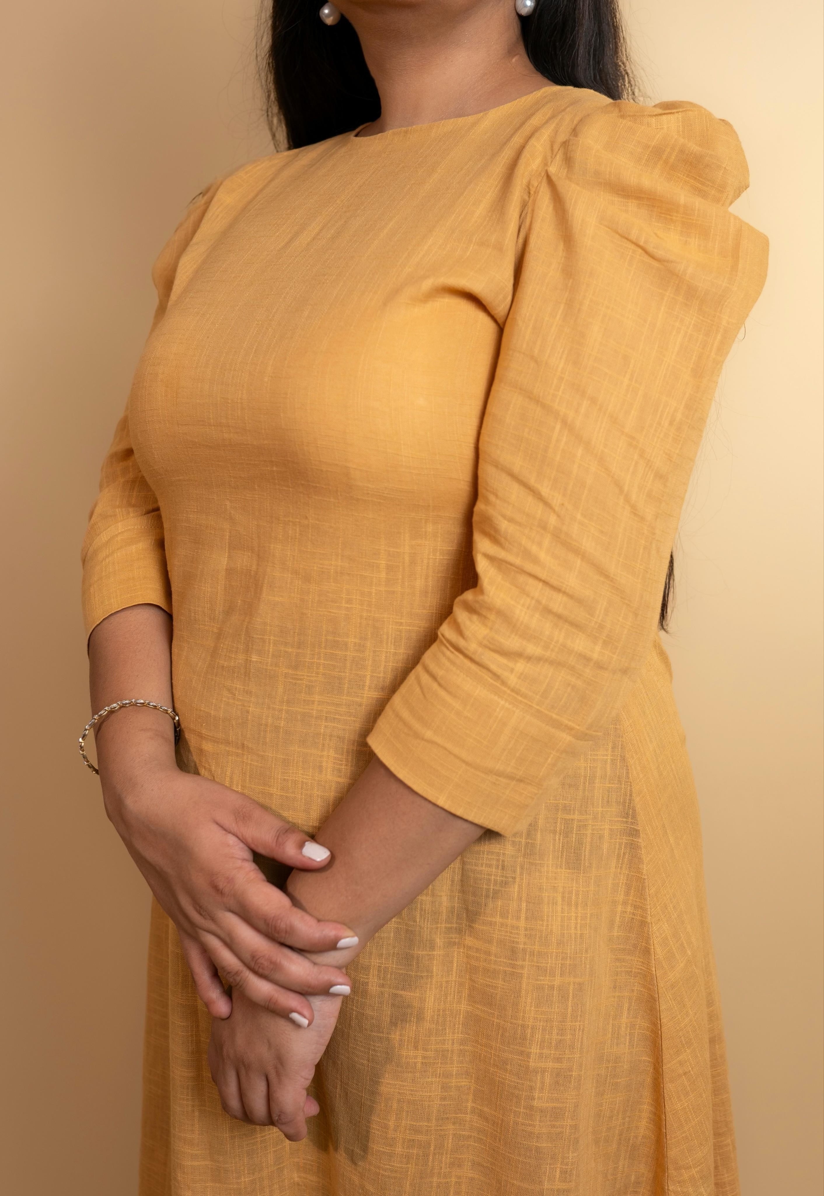 Golden flutter dress