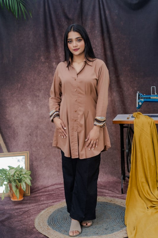 Brown shirt with cuff embellishment