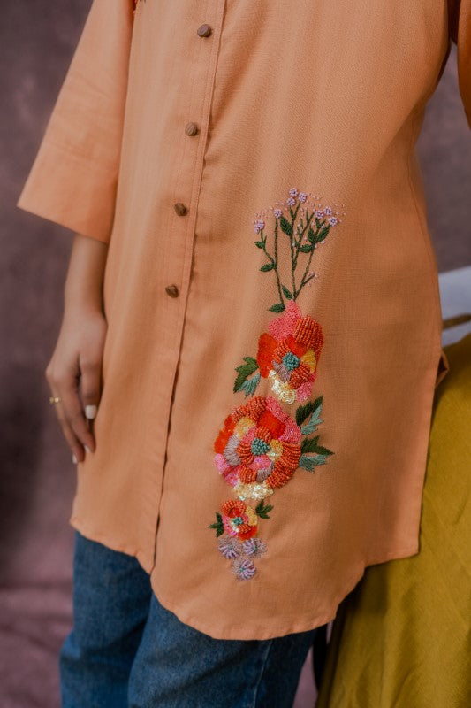 Long shirt with front embellishment