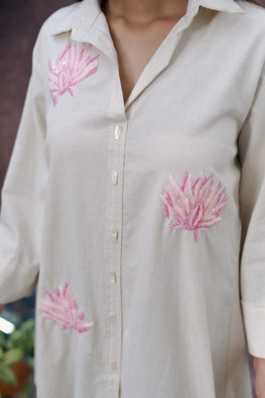 Front flower embellishment shirt