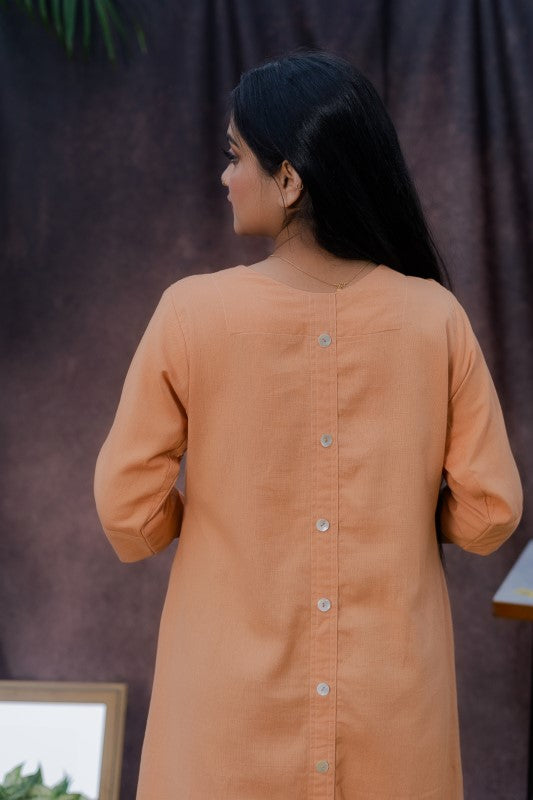 Long kurta with miror and cowrie embellishment.