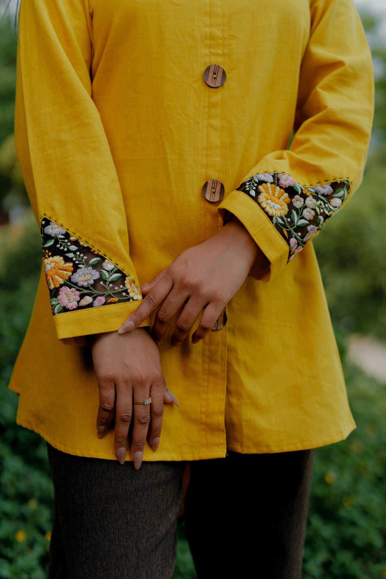 Mustard shirt with floral embroidered sleeves