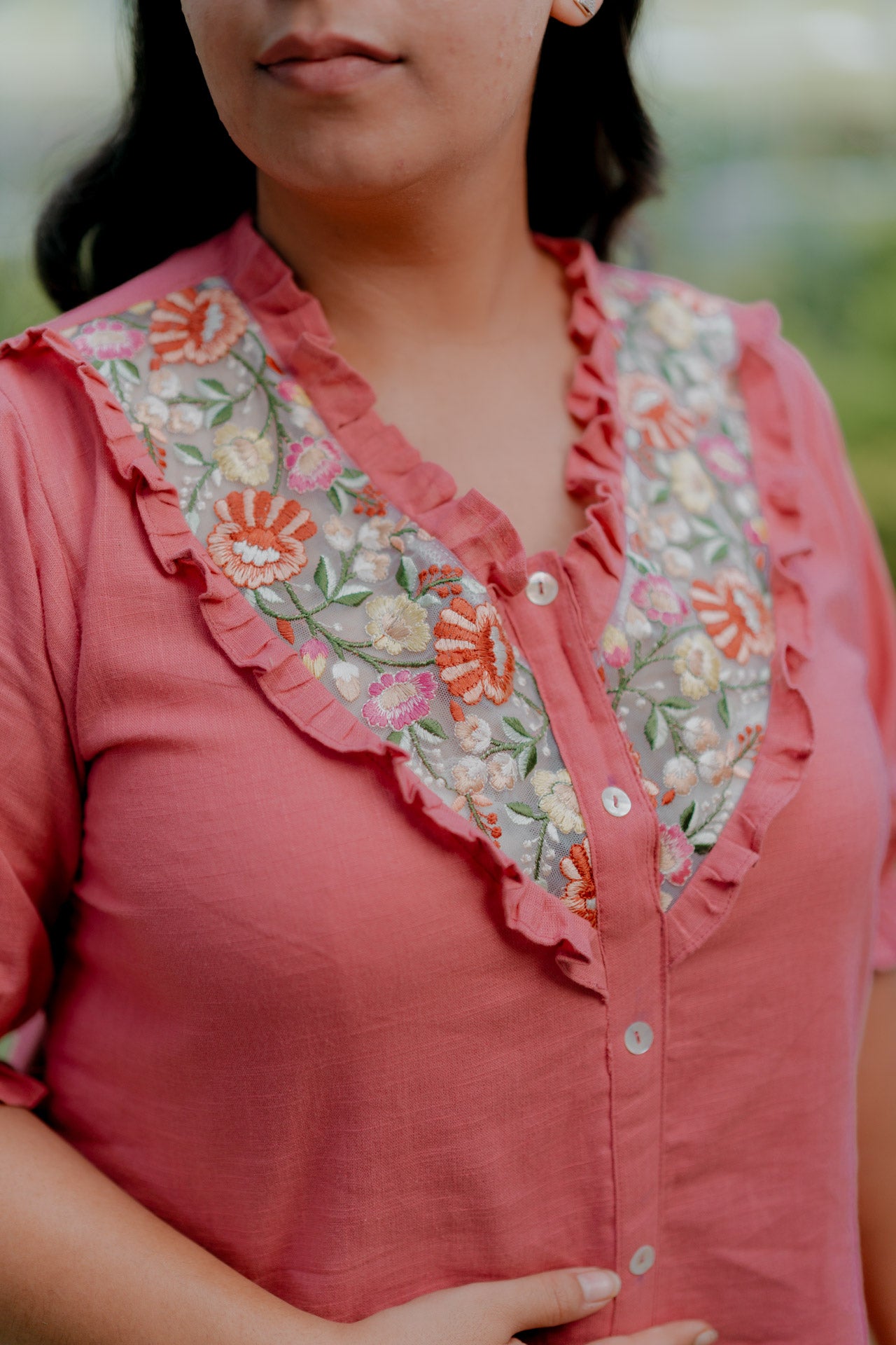 Floral necklace embellished top