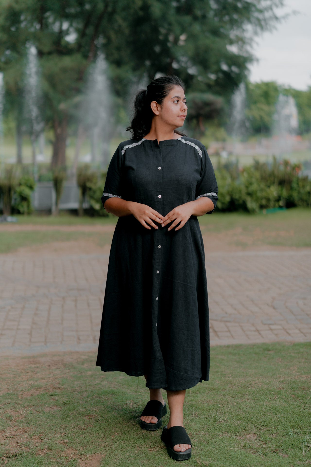 Umbrella dress with floral embellishment