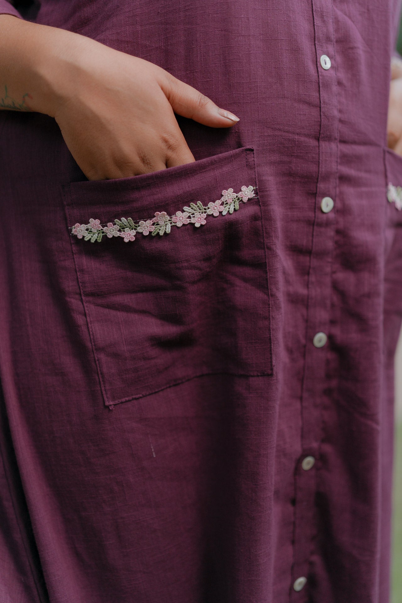 Purple frill dress with floral embellishment