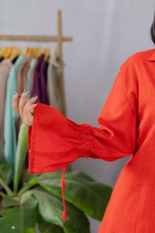 One side embellished red shirt